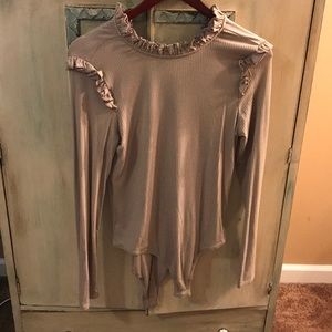 Tan ruffled body suit